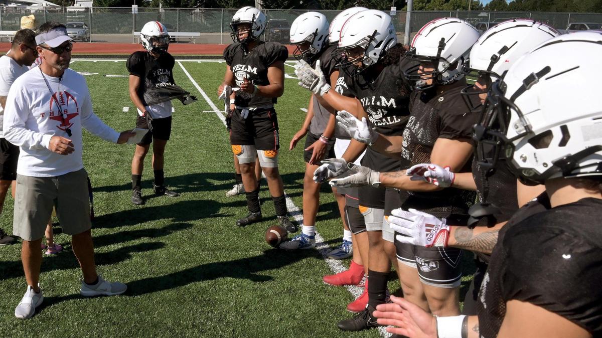 Yelm head coach Jason Ronquillo directs afternoon practice on Monday, August 22 as the Tornados prepare for the 2022 season