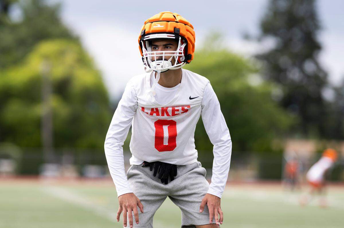 Lakes’ Exavier McChristian listens for instruction during practice at Lakes High School at Lakes High School, on Wednesday, Aug. 21, 2024, in Lakewood, Wash.