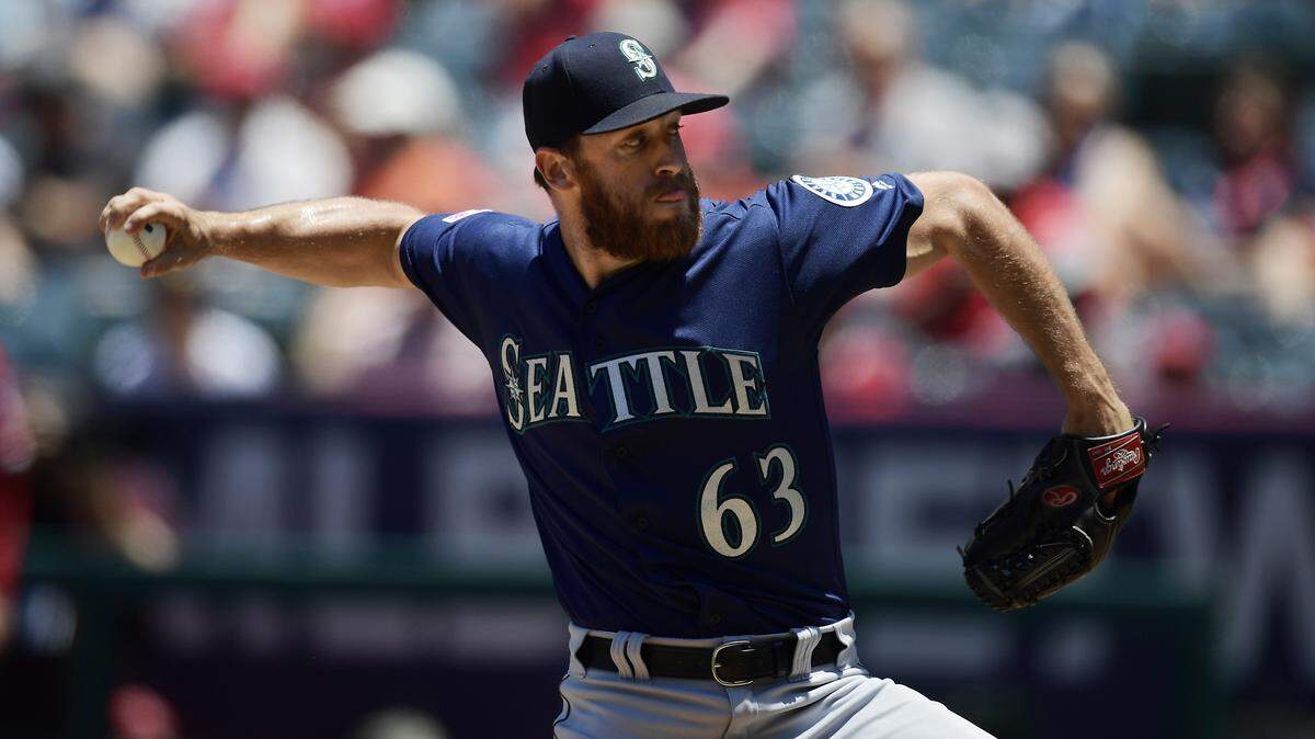 Seattle Mariners starting pitcher Austin Adams throws to the plate during the first inning of a baseball game against the Los Angeles Angels Sunday, June 9, 2019, in Anaheim, Calif.