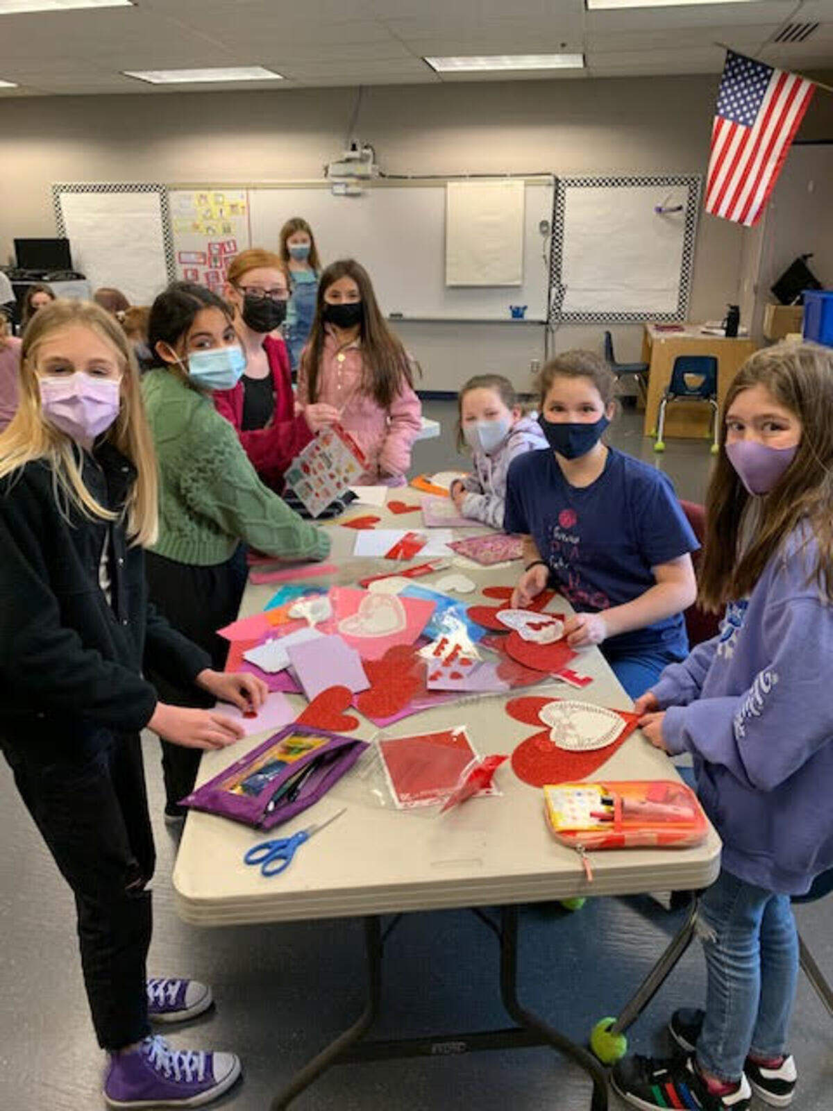 Mrs. Booth’s fifth grade class at Voyager Elementary making handmade Valentine’s for seniors.