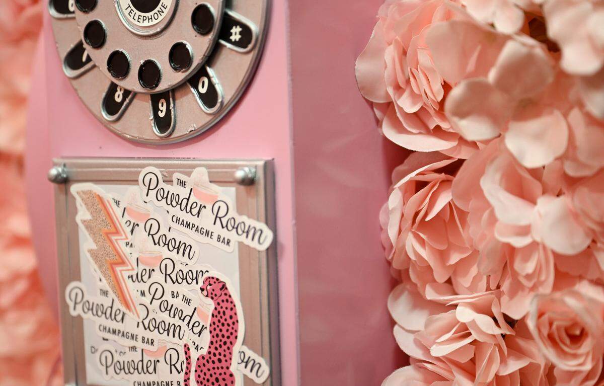 The Powder Room has many Instagram-able spots such as this flowery phone booth, not to mention the powder rooms themselves.