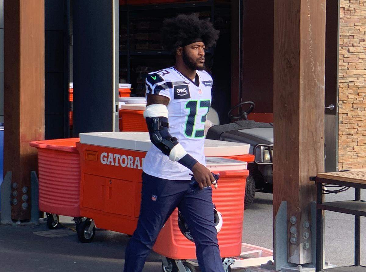 New middle linebacker Ernest Jones IV walks out of the Virginia Mason Athletic Center onto the Seahawks’ practice field for the first time Thursday, Oct. 24, 2024. One day earlier Seattle traded with the Tennessee Titans to acquire the former Super Bowl-winning Jones for the middle of coach Mike Macdonald’s defense.