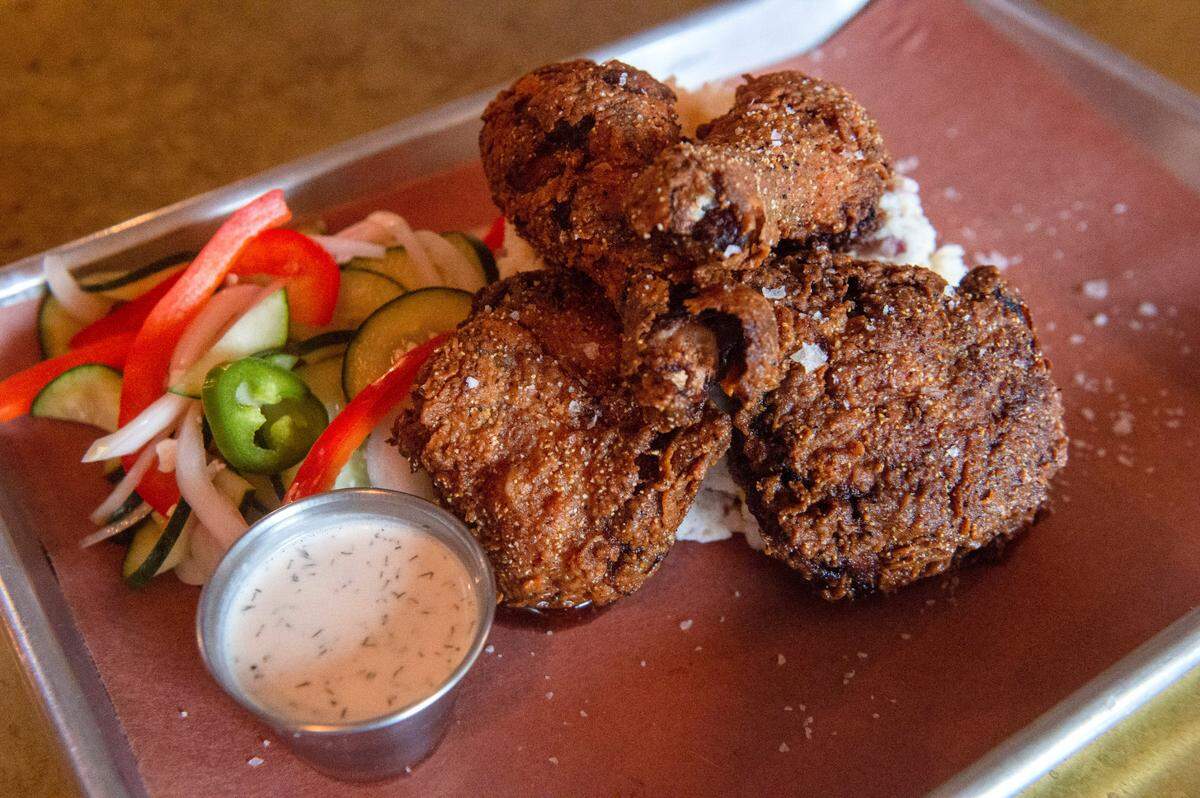 Brimstone PNW, a Gig Harbor barbecue restaurant, is quickly gaining fans for their Sunday night-only buttermilk chicken dinner. Chief among the many secret ingredients is the smoky flavor derived from a fry in 100 percent barbecue fat.