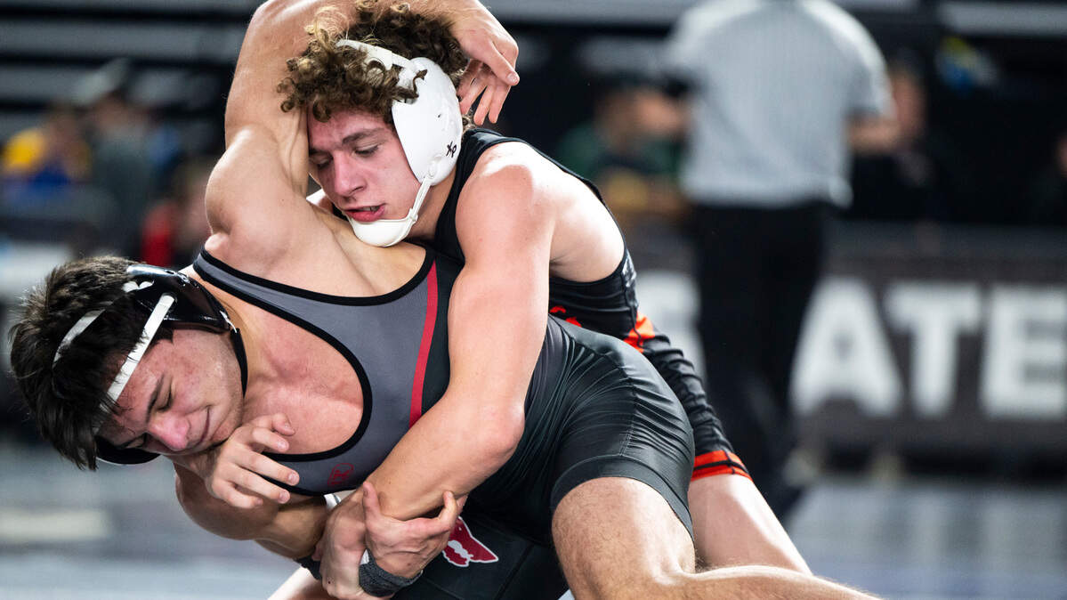 Orting Bryan Dickerson tries to takedown Cedarcrest Francisco Contreras during the 132-pound 2A quarterfinal match at Mat Classic XXXIV on Friday, Feb. 17, 2023, at the Tacoma Dome in Tacoma, Wash.