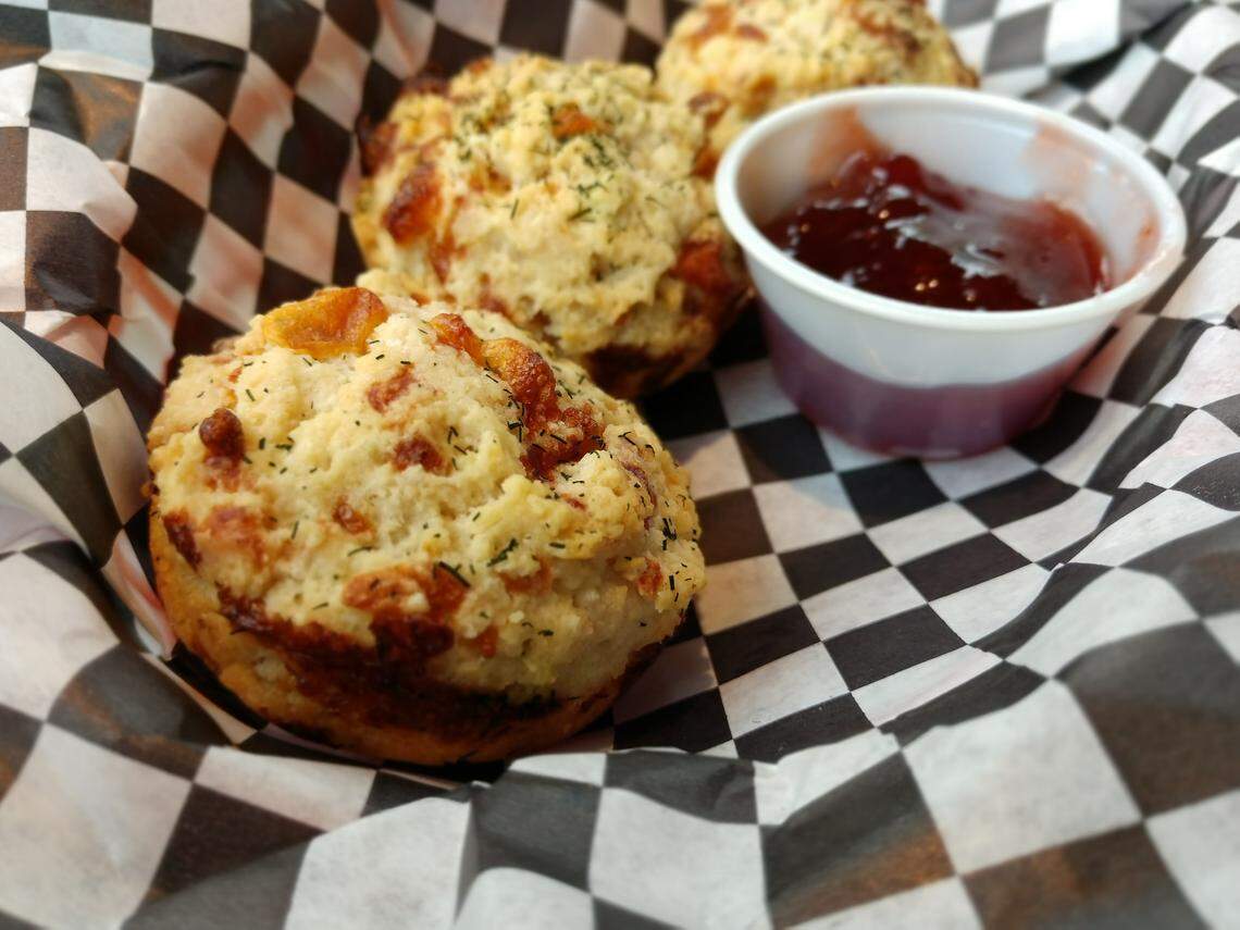 Dill and cheddar biscuits with strawberry jam from Oddfellas Pub & Eatery in Tacoma.
