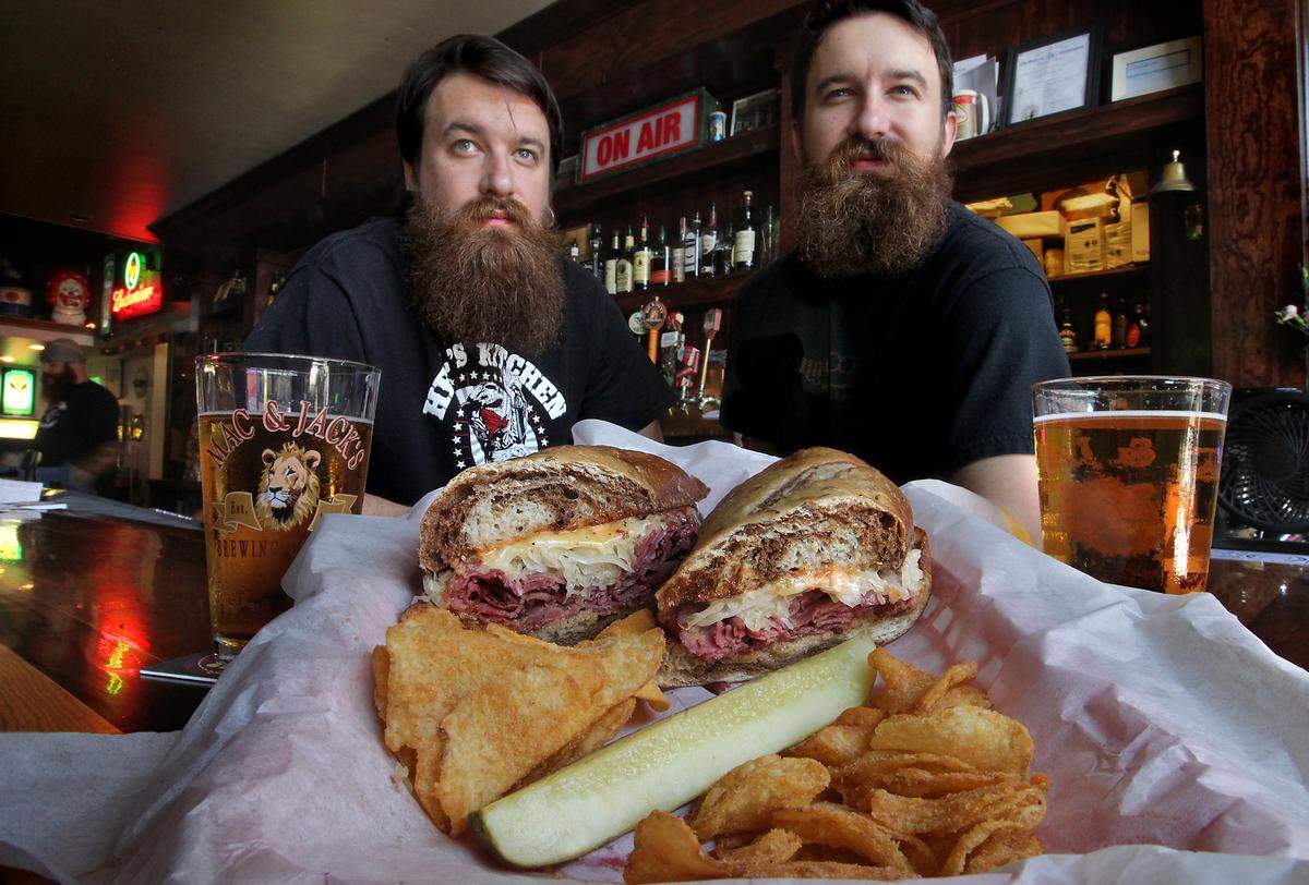 Twin brothers Justin (left) and Rob Peterson make great sandwiches at Eleven Eleven in Tacoma’s Hilltop neighborhood.
