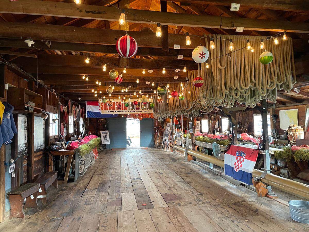 An inside view of the Skansie Brothers Netshed, decorated for Christmas.