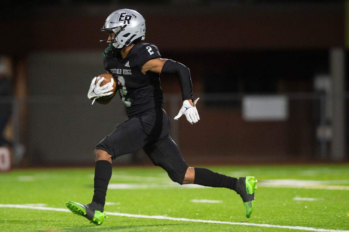 Emerald Ridge wide receiver Kajon Babcock (2) runs down the field with the ball during the second quarter of a game against Curtis at Sparks Stadium in Puyallup, Wash. on Sept. 22, 2022. Emerald Ridge defeated Curtis 42-13.