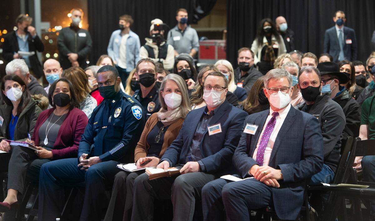 Tacoma and Pierce County officials gather with about 300 business owners and residents concerned with what they perceive as runaway crime during a meeting of Tacoma Safe at the LeMay - America’s Car Museum in Tacoma, on Wednesday, Jan. 26, 2022.