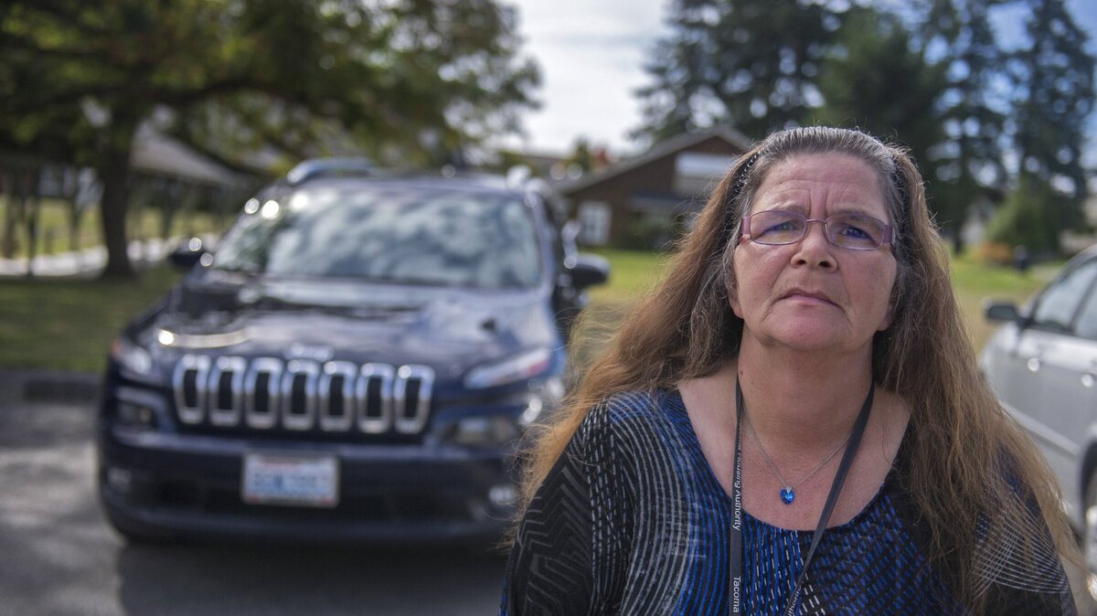 Cindy Bergee and her 2015 Jeep Cherokee, a vehicle she took out a loan with 25 percent interest to buy.  She’s since refinanced with a program that helps people get out from under predatory loans.