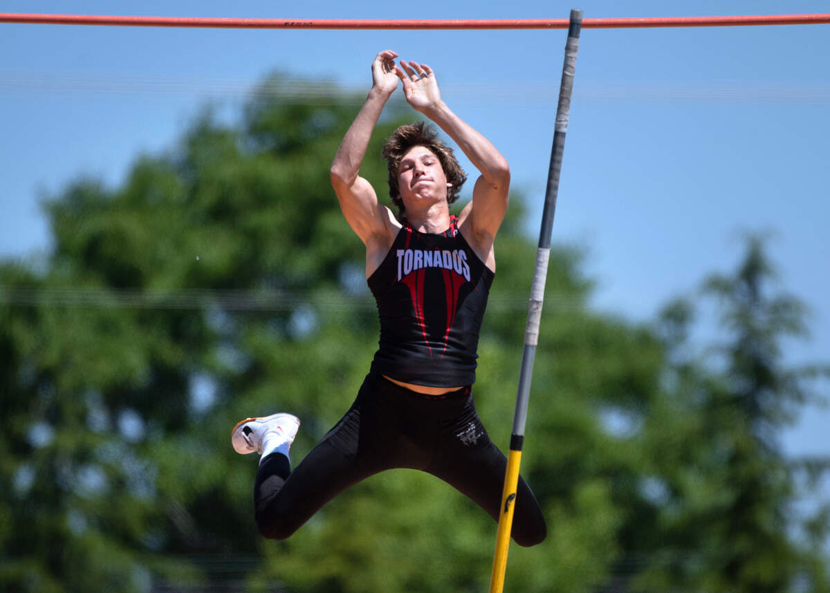 Yelm’s Jordan Lasher clears the bar en route to a state title in the 3A boys pole vault competition during the second day of the WIAA state track and field championships at Mount Tahoma High School in Tacoma, Washington, on Friday, May 26, 2023. Lasher won the event with a vault of 15’ 6”.