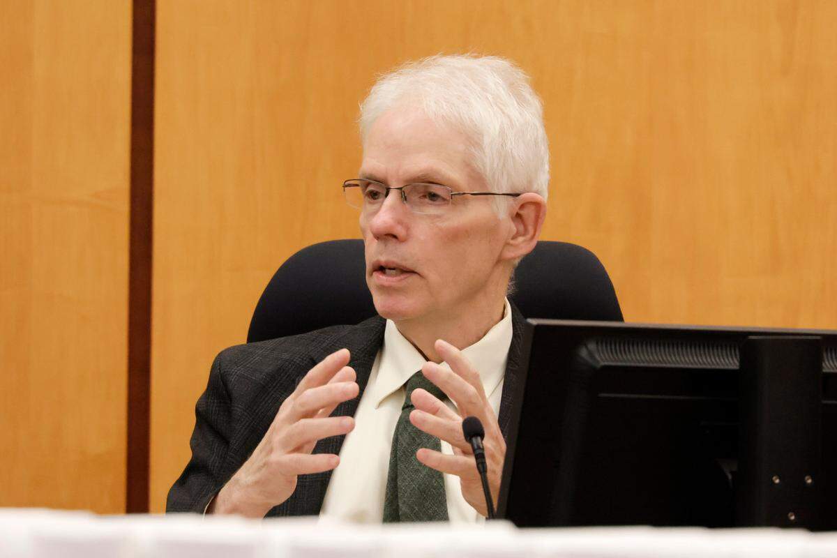 Dr. Thomas Clark, the former Pierce County medical examiner who conducted the autopsy on Manuel “Manny” Ellis, explains the working of a heart as he testifies.