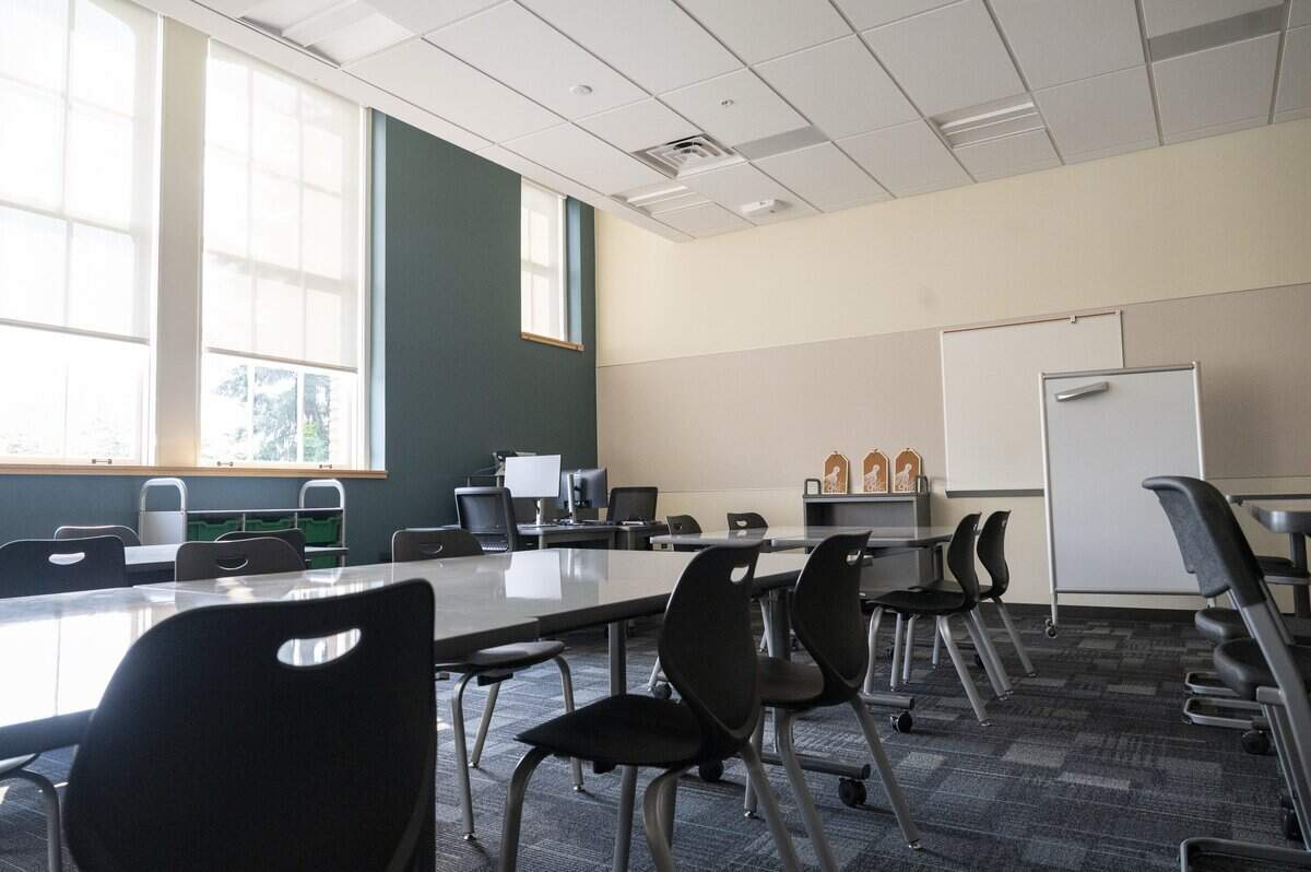 A classroom at newly renovated Oakland Secondary School is pictured on Thursday, Sept. 4, 2025, in Tacoma, Wash. The rooms feature technology upgrades, high ceilings and white board desks for students.