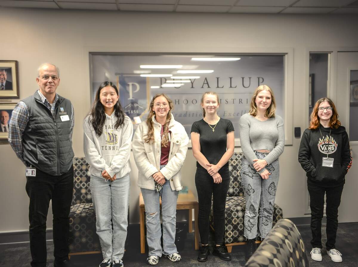 From left to right: Puyallup School District Superintendent John Polm, high school junior Hailey Kim, high school junior Alejandra Gonzalez, high school senior Cimerra Killian Porter, high school junior Korinne Dutton, and high school senior Luka Rogers.