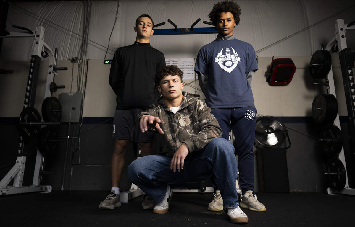 Cascade Christian’s Caleb Donahue, Donovan Walson and Tayven Collins pose for a portrait at Cascade Christian Schools on Wednesday, Oct. 29, 2025, in Puyallup, Wash.