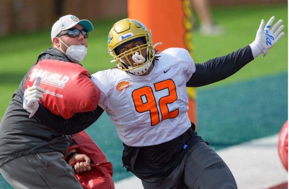 UCLA defensive tackle Osa Odighizuwa (92) commanded attention with a standout performance in practices leading up to the annual Senior Bowl in Mobile, Alabama, in late January.