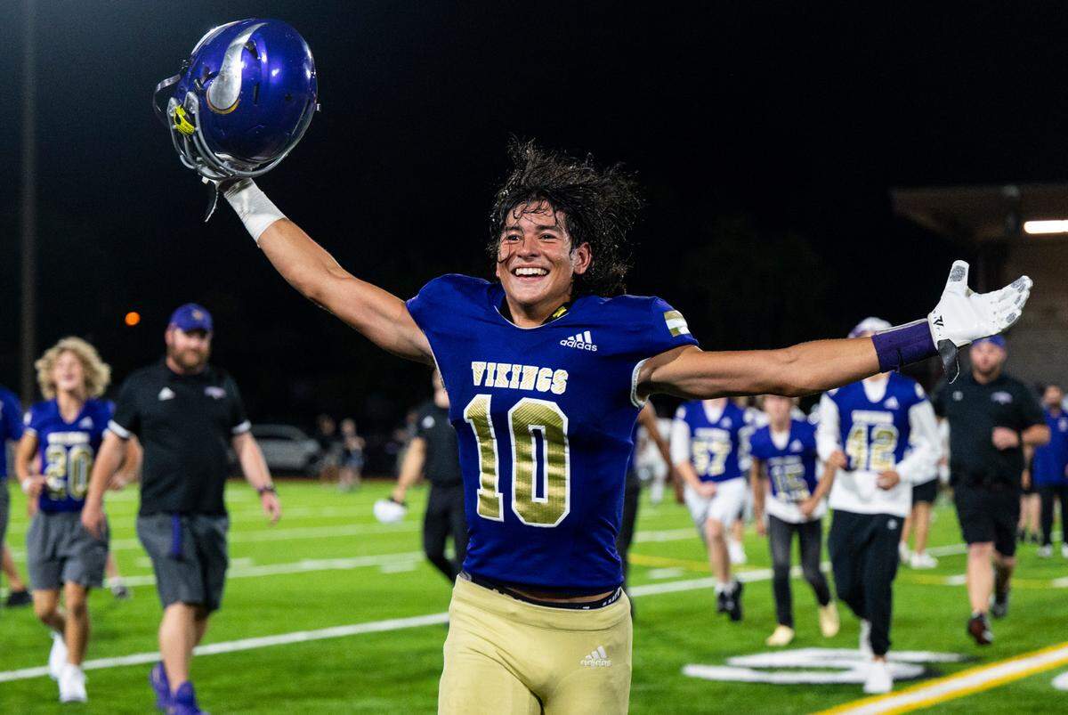 Puyallup wide receiver Jacob Velasco (10) celebrates after winning the game in the last quarter beating Emerald Ridge 29-28 at the season opener game at Sparks Stadium in Puyallup Wash. Sept. 2, 2022.