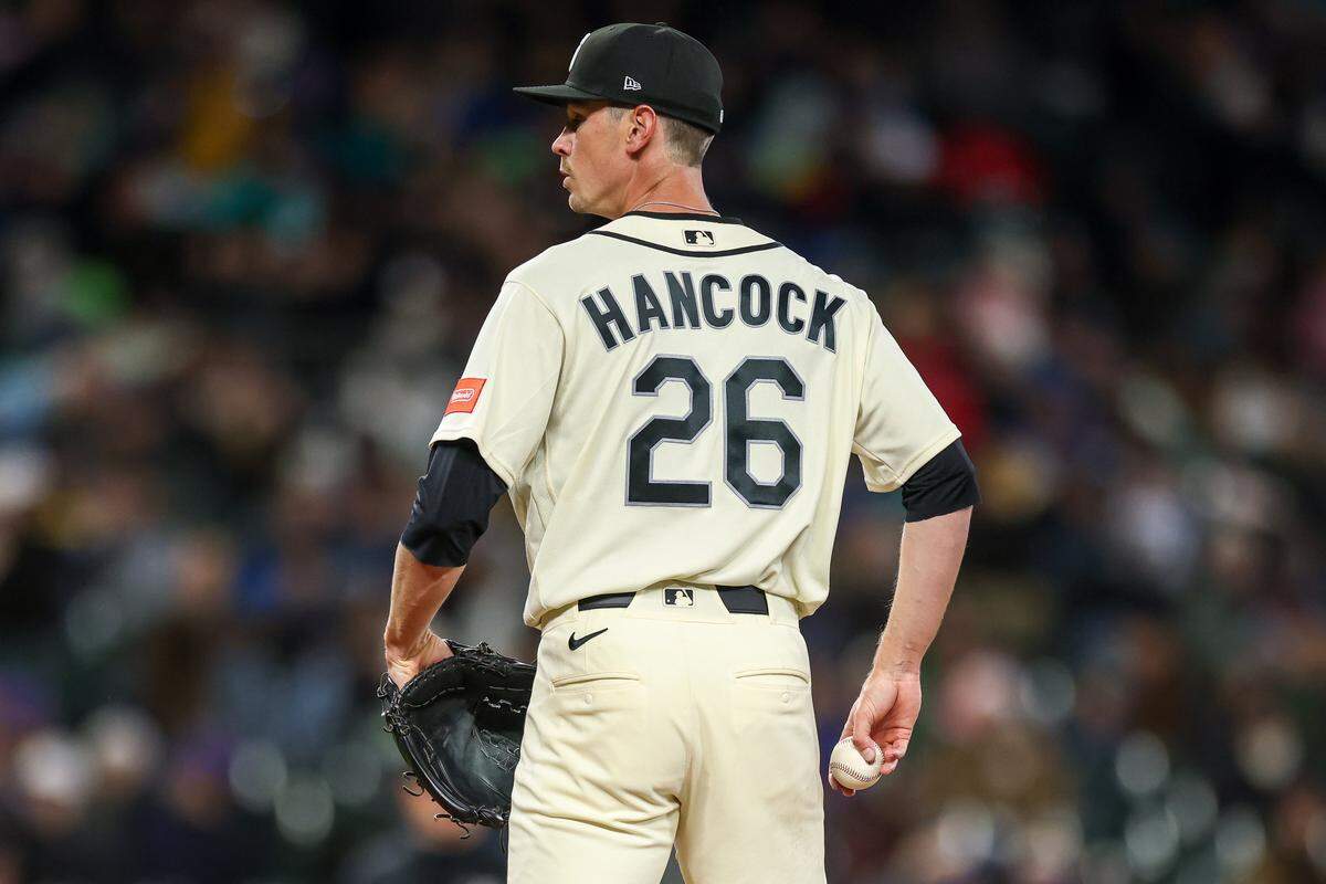 SEATTLE, WASHINGTON - MARCH 29: Emerson Hancock #26 of the Seattle Mariners prepares to deliver a pitch during the sixth inning of a game against the Cleveland Guardians at T-Mobile Park on March 29, 2026 in Seattle, Washington. (Photo by Jack Compton/Getty Images)