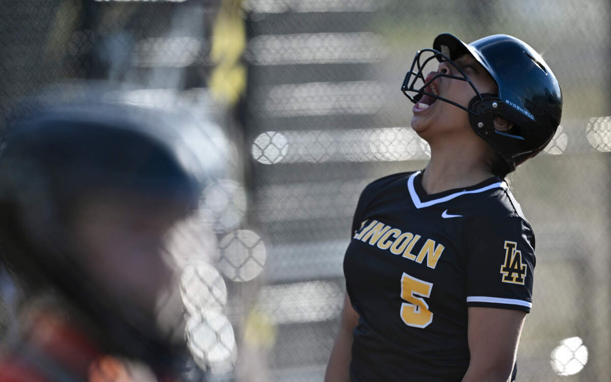 Lincoln’s Lilo Time reacts to Joy Wilde’s home run while running to home plate against Lakes during the game at Lincoln High School, on Tuesday, April 30, 2024, in Tacoma, Wash.