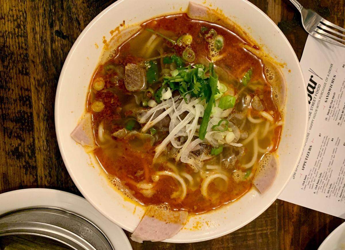 The new La Ca 38th serves a slightly shorter menu than the original off Sixth Ave, but more than the Parkland outpost. The noodle soup selection includes both meat and vegetarian options.