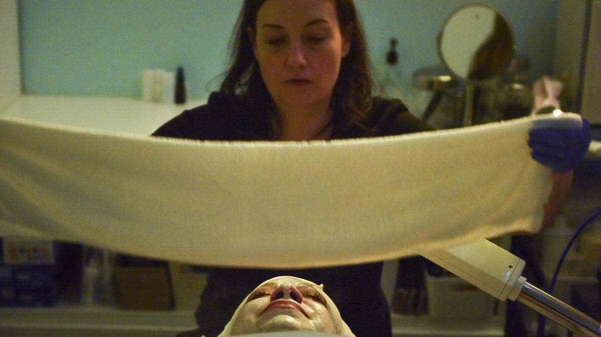 Dawn Franklin, an aesthetician, performs a facial on Maria Harris using CBD-infused cleansers, masks and oils at Joy's Spa in Washington.