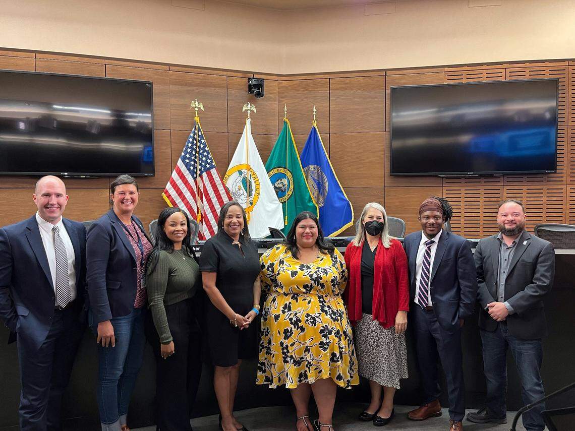 Left to right: Council members John Hines, Kristina Walker and Kiara Daniels, Mayor Victoria Woodards, appointed council member Olgy Diaz, Deputy Mayor Catherina Ushka, council members Keith Blocerk and Joe Bushnell.