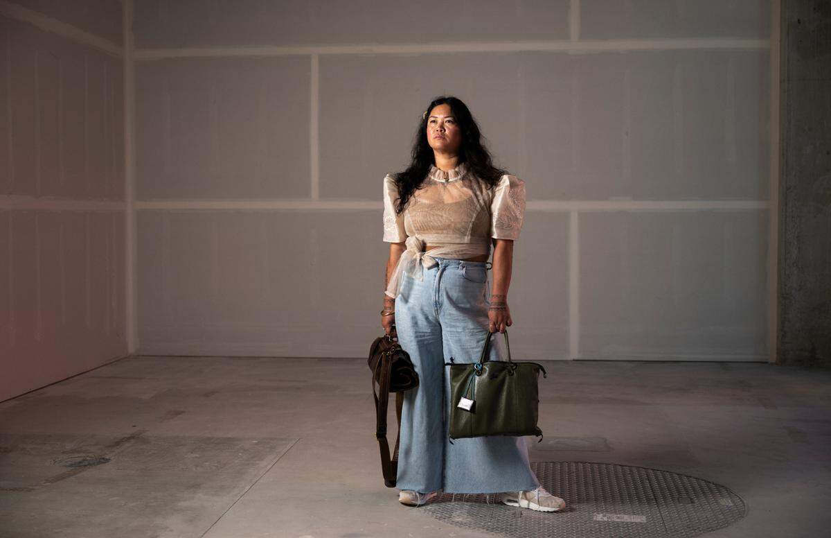 Chef Jan Parker's Reyna Filipina Kitchen was selected by Tacoma Housing Authority for one of their commercial units in the Housing Hilltop project. She stands in the now-empty space at 1122 S 11th St. on Oct. 9, 2024.