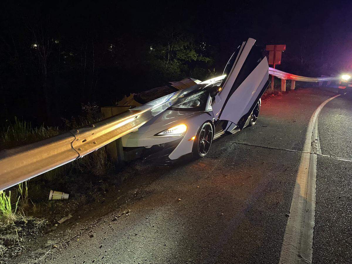The driver of a 2020 McLaren 600 LT collided with a guardrail Monday night on a state Route 512 exit-ramp in Tacoma, according to the Washington State Patrol. The driver of the vehicle fled the scene.