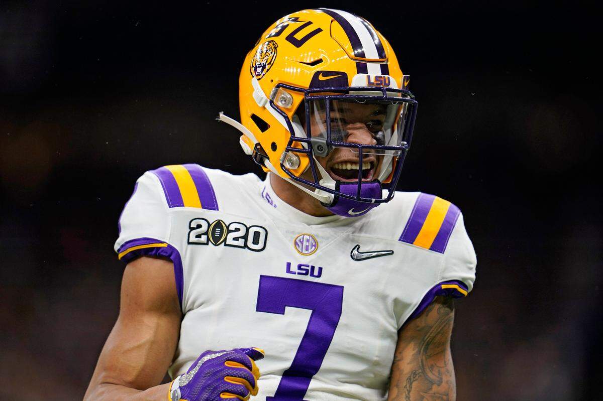 LSU safety Grant Delpit celebrates during the first half of a NCAA College Football Playoff national championship game against Clemson Monday, Jan. 13, 2020, in New Orleans. (AP Photo/David J. Phillip)
