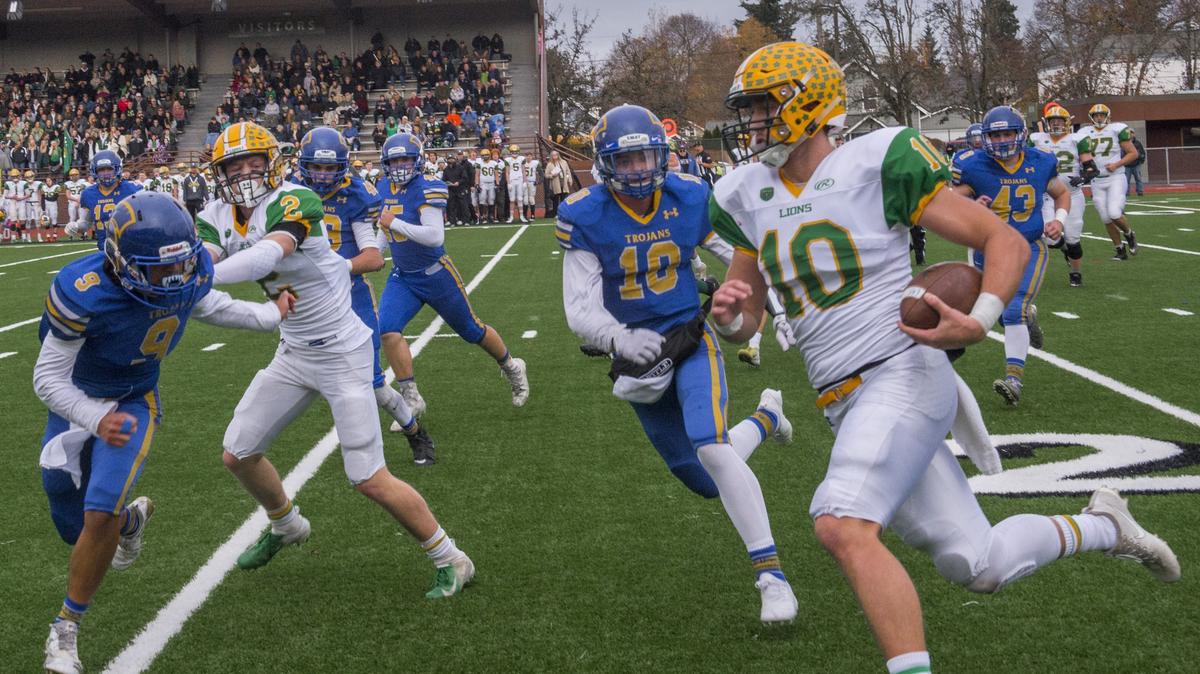 Quarterback James Marsh of Lynden on a keeper in a AA football semi-final championship game held in Sparks Stadium in Puyallup, November 24, 2018.  Lynden beat Fife 31-0.