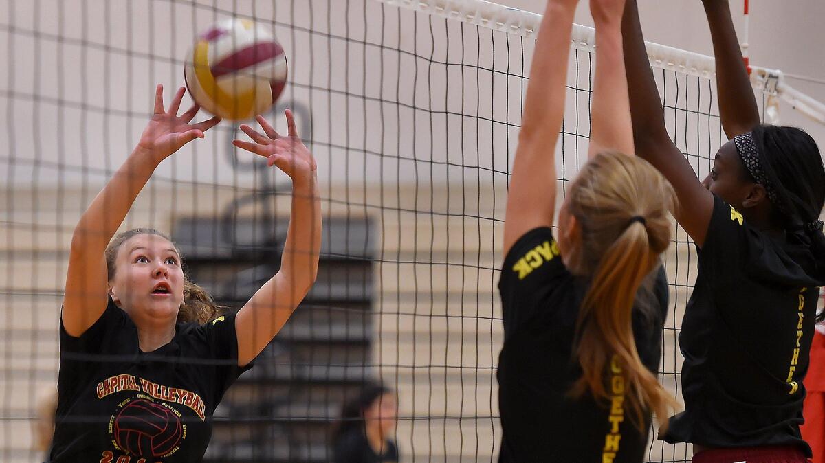 Capital junior Bailey Glenn returns a ball during the Cougars’ Sept. 30th practice.