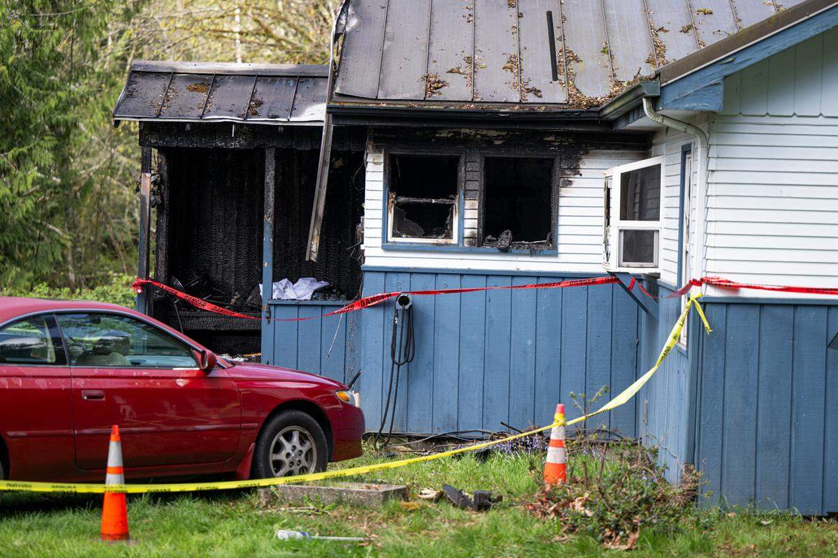 The scene of a suspicious house fire that left two people dead in 15500 block of 14th Ave. NW., on Wednesday, April 9, 2025, in Maplewood, Wash.
