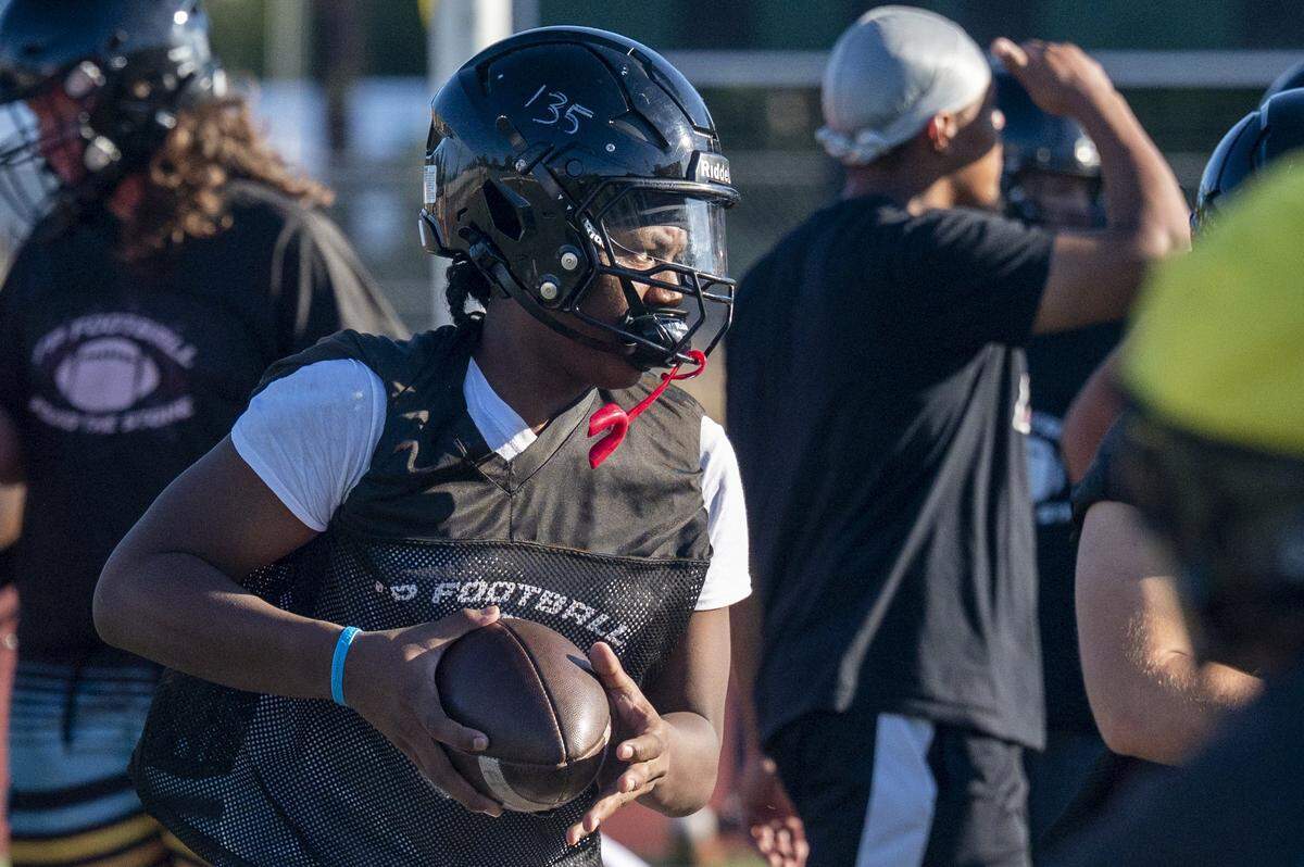 Franklin Pierce players run through a play as the team practices on Wednesday, Aug. 20, 2025, in Tacoma, Wash.