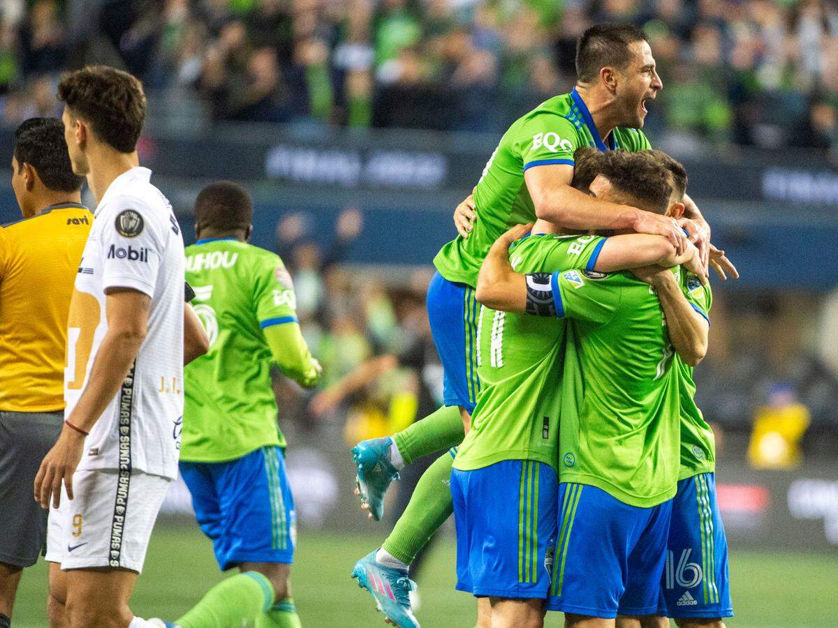 Seattle Sounders midfielder Nicolás Lodeiro (10) celebrates the team’s 3-0 over Pumas to win the CONCACAF Champions League Final at Lumen Field in Seattle, on Wednesday, May 4, 2022.