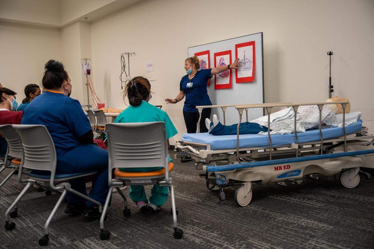 On Wednesday, July 13, 2022 which was the third day of M.A.S.H. camp, registered nurse Tiffanie Hoffmeyer’s station teaches students about the heart.