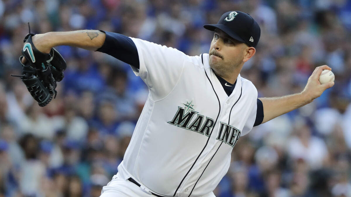 Seattle Mariners starting pitcher James Paxton throws against the Toronto Blue Jays during the first inning of a baseball game Saturday, Aug. 4, 2018, in Seattle. (AP Photo/Ted S. Warren)