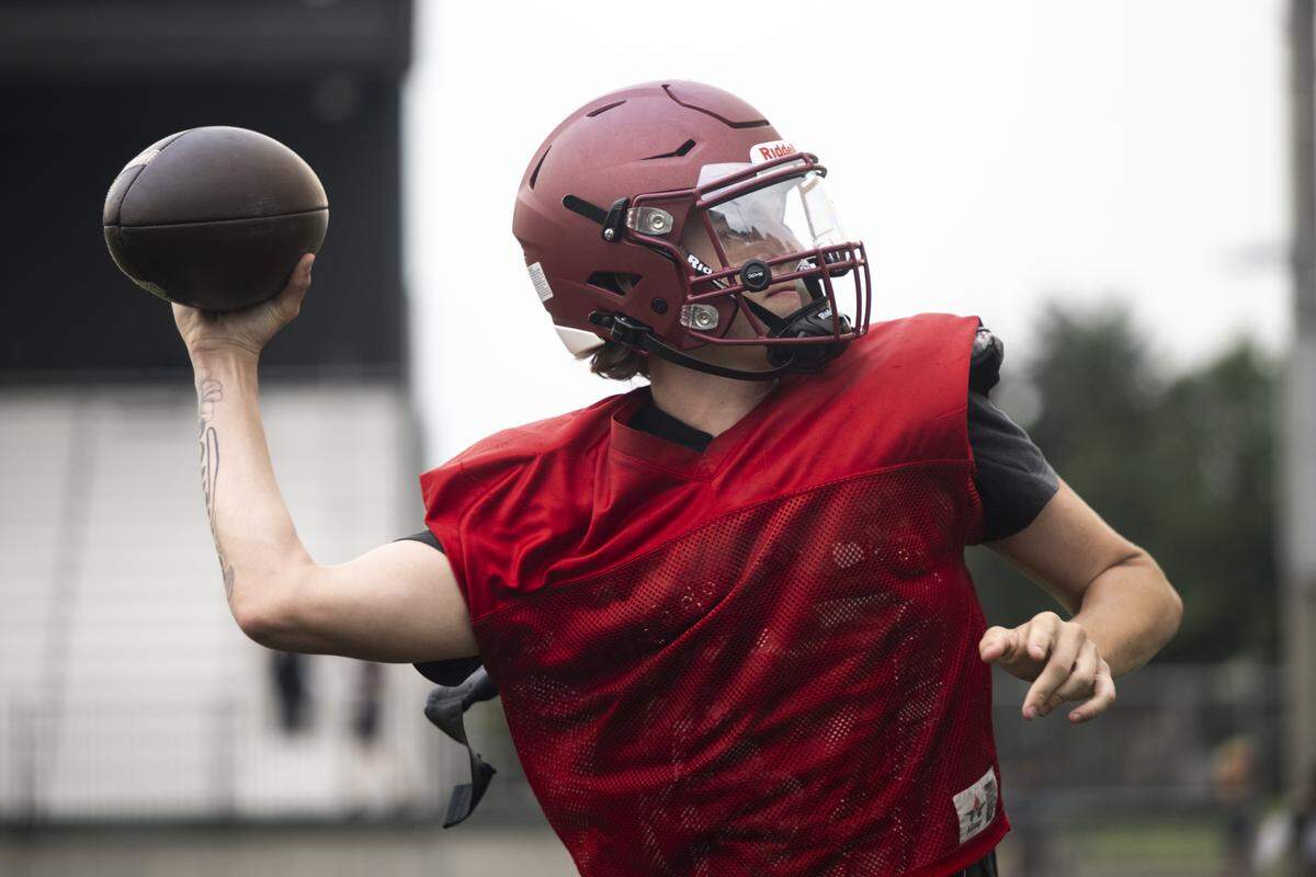 Bethel quarterback Evan Barnes throws during a football practice at Bethel High School on Wednesday, Aug. 27, 2025, in Spanaway, Wash.