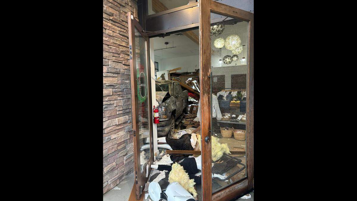 A vehicle crashed into a boutique in the 4700 block of Point Fosdick Drive Tuesday, Jan. 6, 2026, in Gig Harbor, Wash. The collision led to a gas leak, and Gig Harbor Fire personnel transported one person to the hospital.