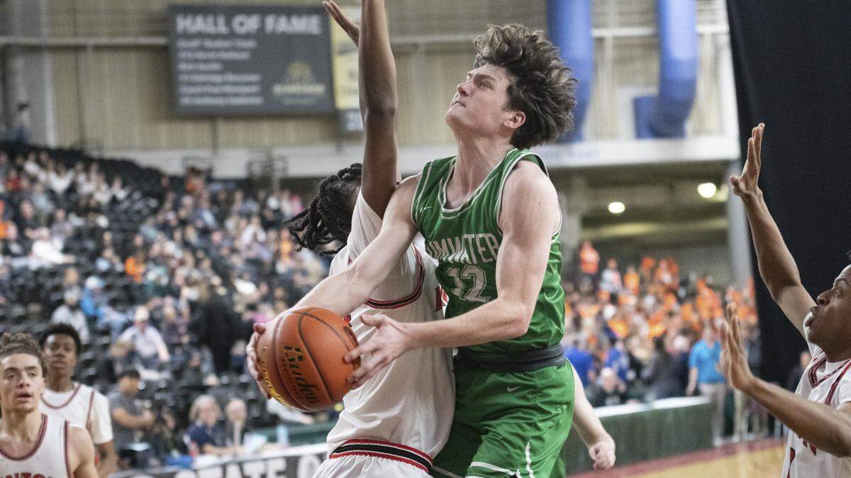 Tumwater guard Brayden Oram (12) drives to the basket against Renton in the opening round of the Class 2A boys state basketball tournament on Wednesday, March 1, 2023 at the Yakima Valley SunDome in Yakima, Wash.