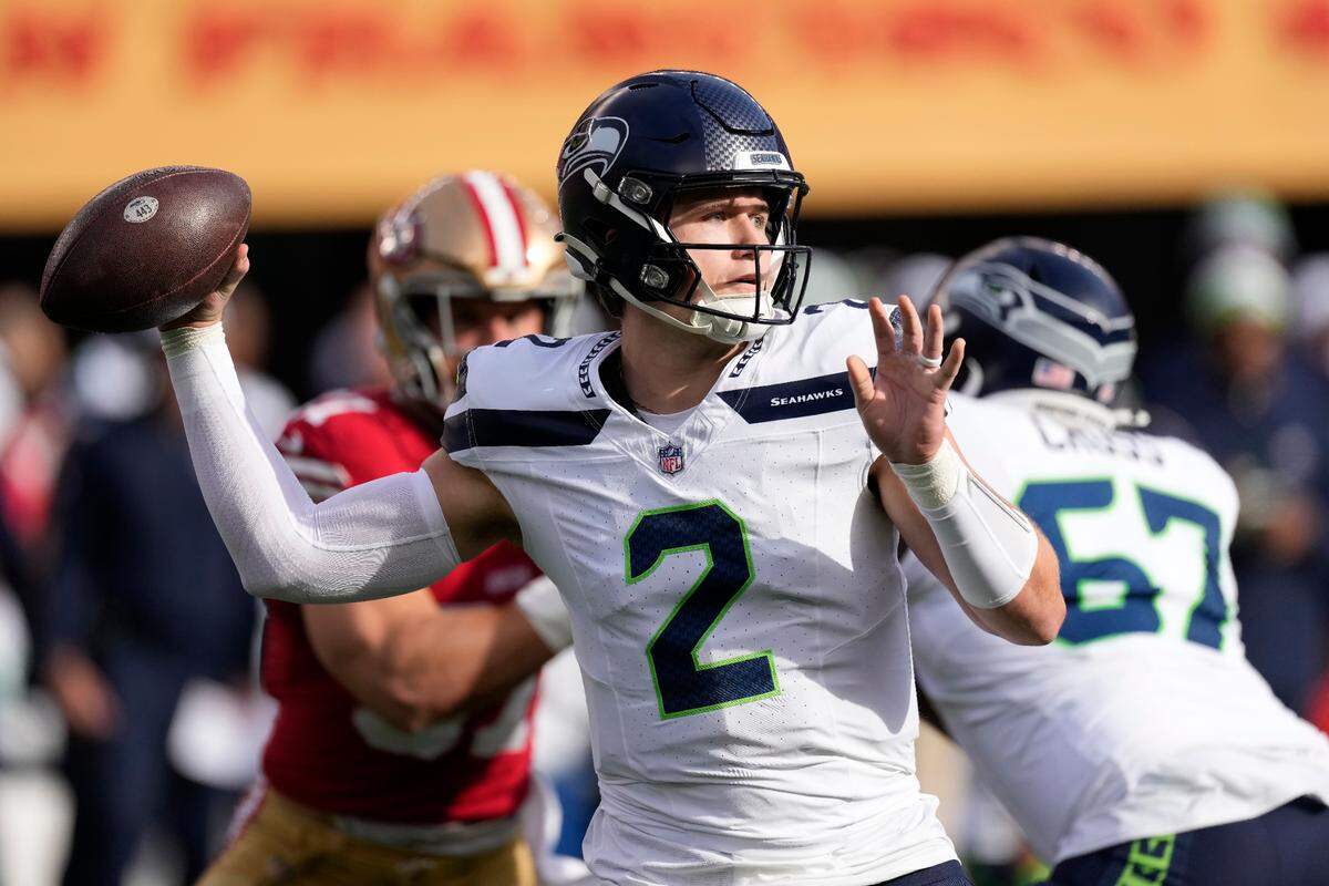 Seattle Seahawks quarterback Drew Lock (2) passes against the San Francisco 49ers during the first half of an NFL football game in Santa Clara, Calif., Sunday, Dec. 10, 2023. (AP Photo/Godofredo A. Vásquez)
