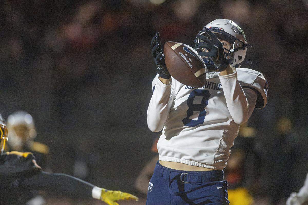 Bellarmine’s Ben Heisel (8) catches the ball in the end zone for a touchdown against Mount Tahoma on Friday, Oct. 10, 2025, at Mount Tahoma in Tacoma, Wash.