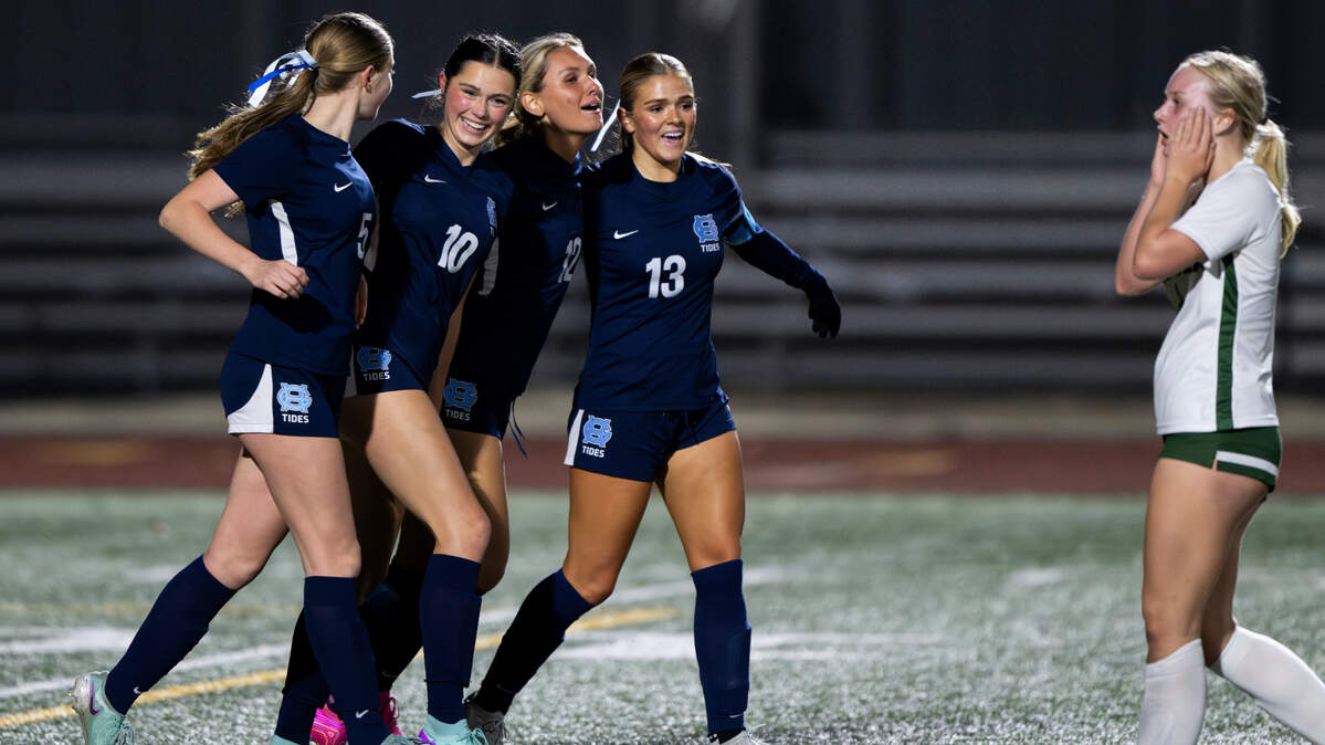 Gig Harbor’s Karin Heikkila (10) and teammates celebrate Heikkila’s first goal against Peninsula during the first half of the Class 3A district 3/4 girls soccer championship at Mount Tahoma High School on Thursday, Nov. 7, 2024 in Tacoma, Wash.