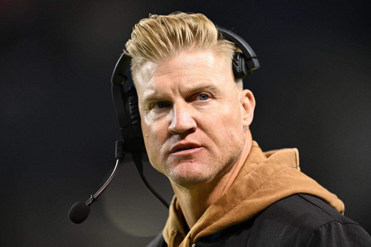 Nov 9, 2023; Chicago, Illinois, USA;  Carolina Panthers quarterbacks coach Josh McCown watches his team play against the Chicago Bears at Soldier Field. Mandatory Credit: Jamie Sabau-USA TODAY Sports