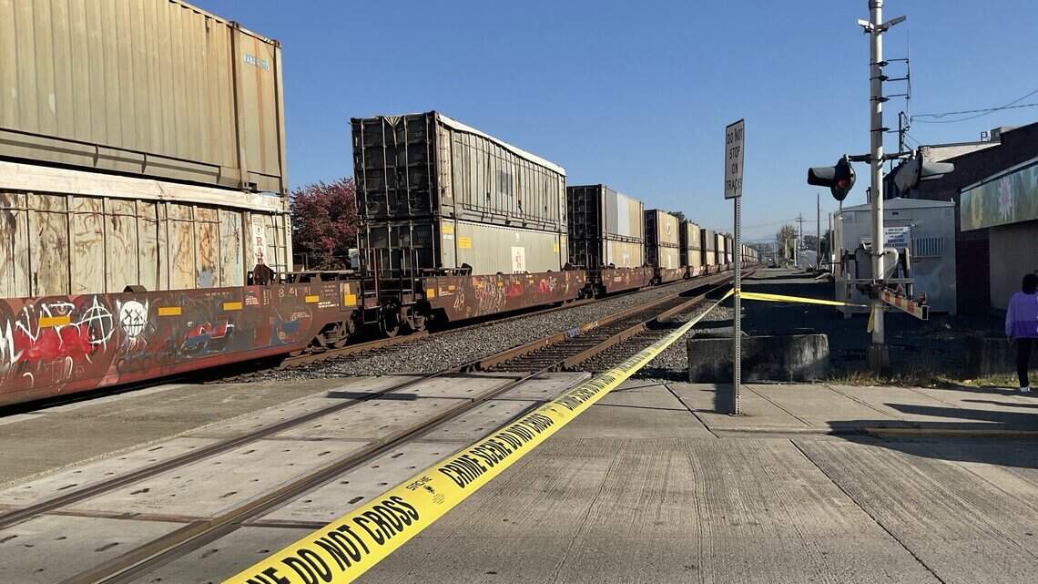 1 person killed, another hospitalized after being hit by train in Puyallup
