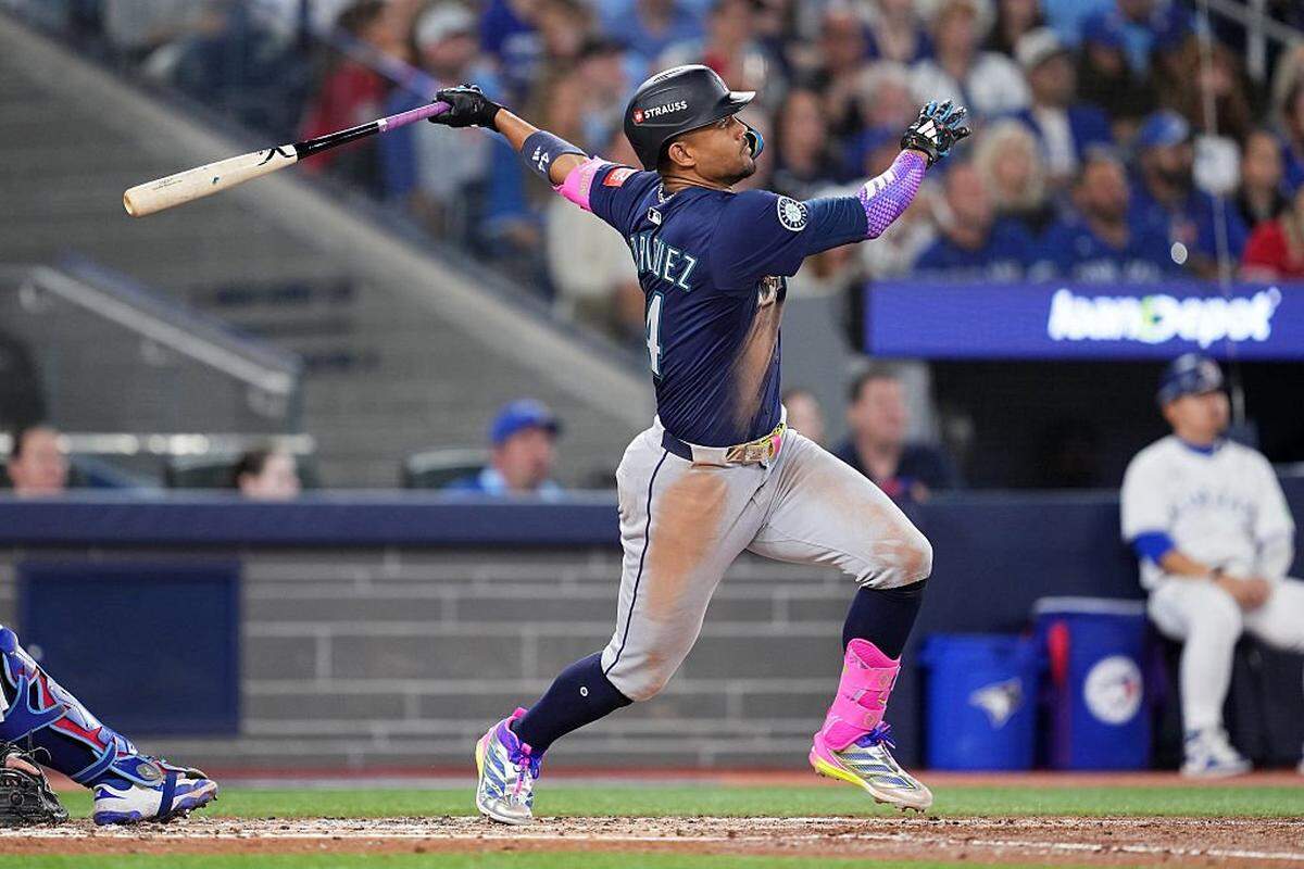 TORONTO, ONTARIO - OCTOBER 20: Julio Rodriguez #44 of the Seattle Mariners hits a home run against the Seattle Mariners during the third inning in game seven of the American League Championship Series at the Rogers Centre on October 20, 2025 in Toronto, Ontario. (Photo by Mark Blinch/Getty Images)