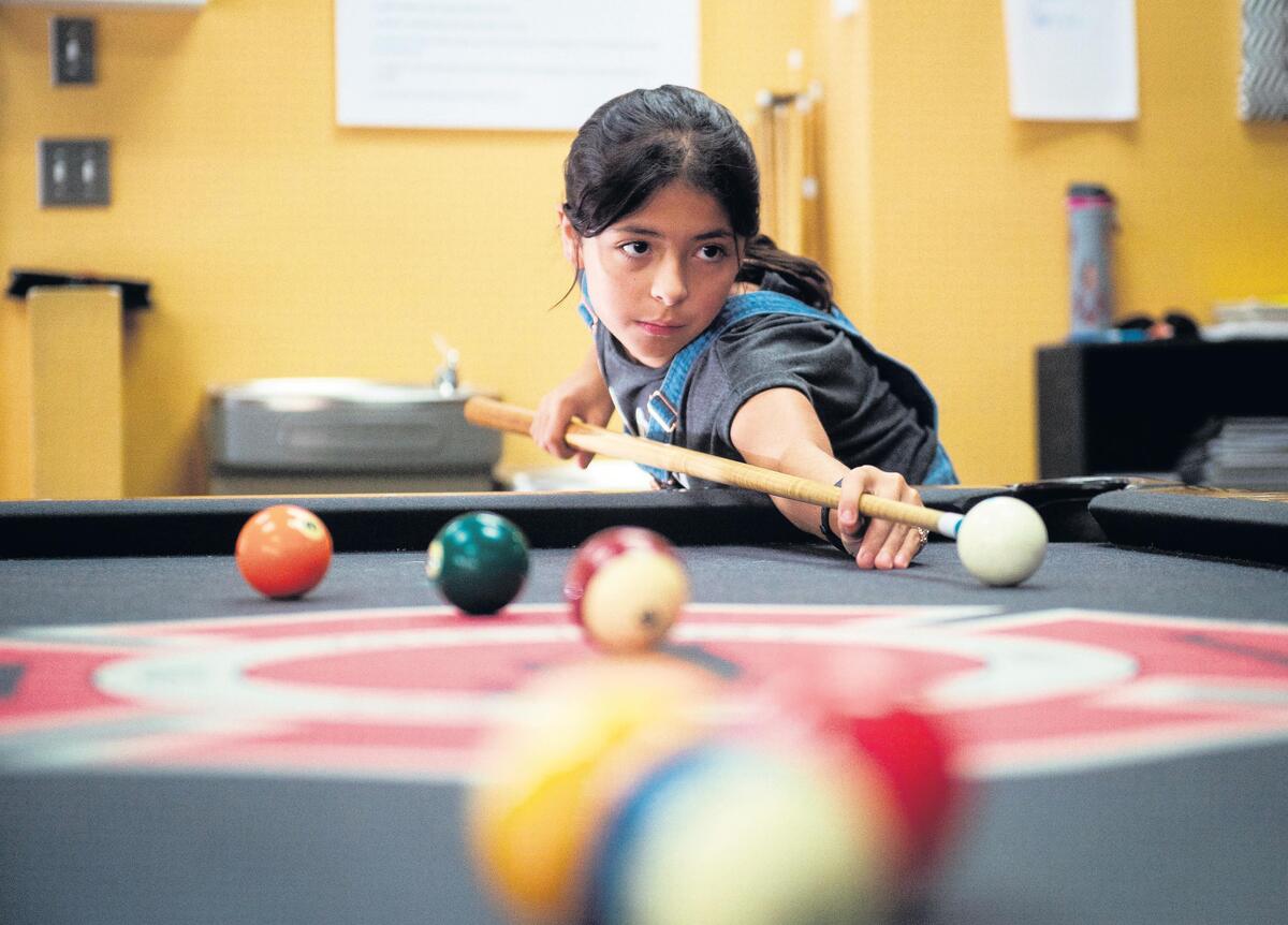 Danica Seville lines up a shot at the Red Barn in Key Peninsula on Sept. 17.
