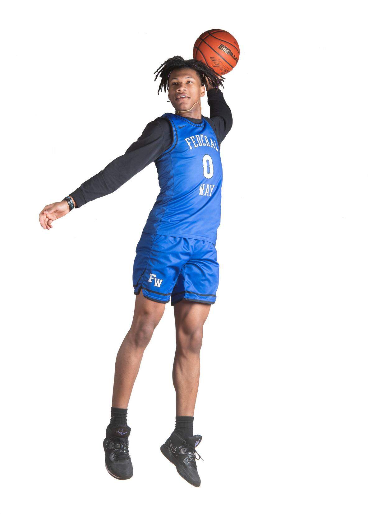 Federal Way senior Vaughn Weems is one of six players named to The News Tribune’s All Area Boys Basketball Team. He is photographed at Curtis High School in University Place, Washington, on Saturday, March 11, 2023.