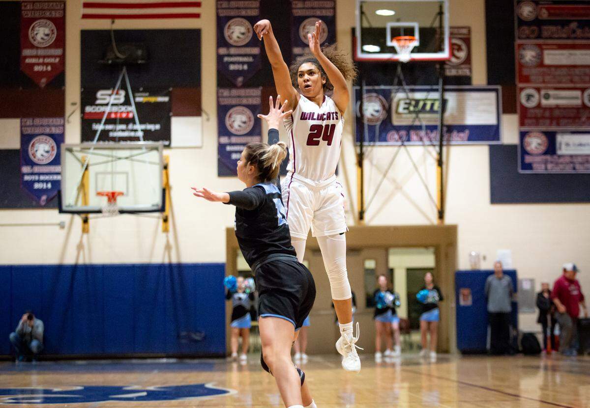 Jayda Noble (24) of Mt. Spokane High School goes up for a shot against Peyton Howard (20) of Central Valley during a GSL game in Mead, Wash on Jan. 7, 2019. Mt. Spokane won 51-40. Libby Kamrowski/ THE SPOKESMAN-REVIEW