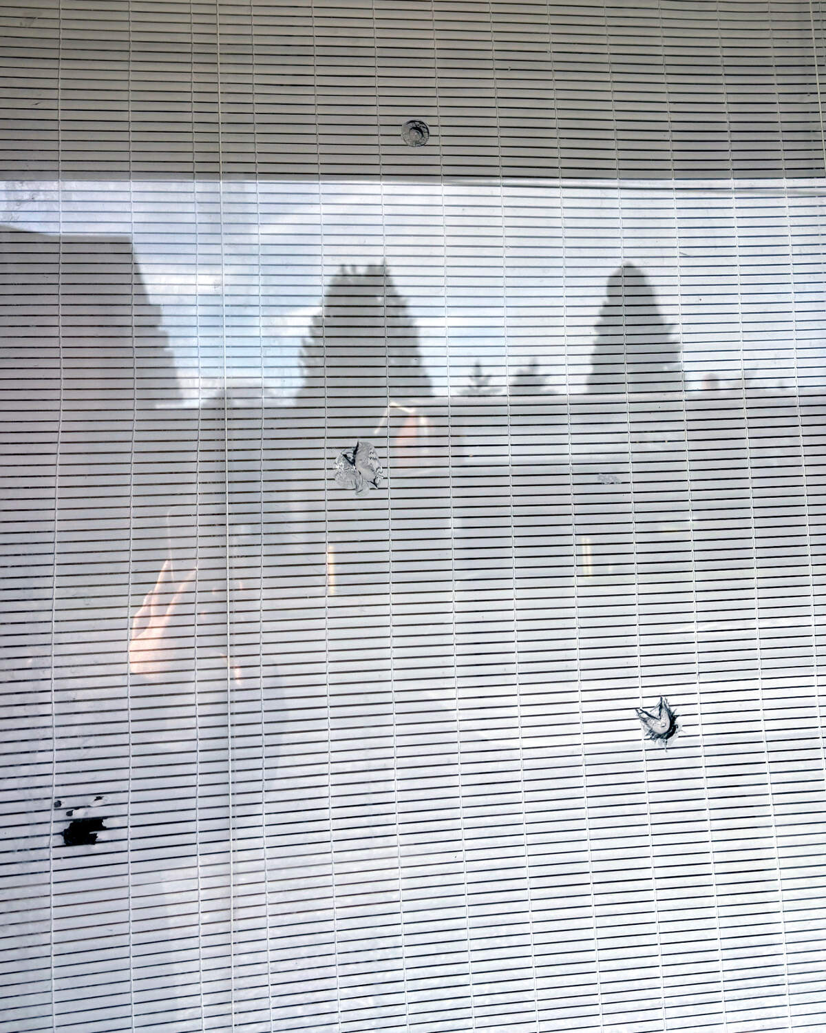 Living Word Ministry in Tacoma has faced an uptick in vandalism, with bullet holes being littered in their windows.