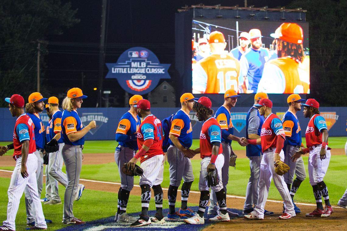 Aug 19, 2018; Williamsport, PA, USA; The New York Mets and Philadelphia Phillies shake hands at the conclusion of the MLB little league classic at BB&T Ballpark at Historic Bowman Field. Mandatory Credit: Bill Streicher-USA TODAY Sports